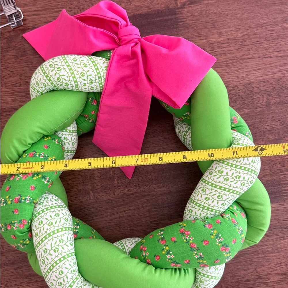 Vintage braided fabric plush wreath with pink ribbon